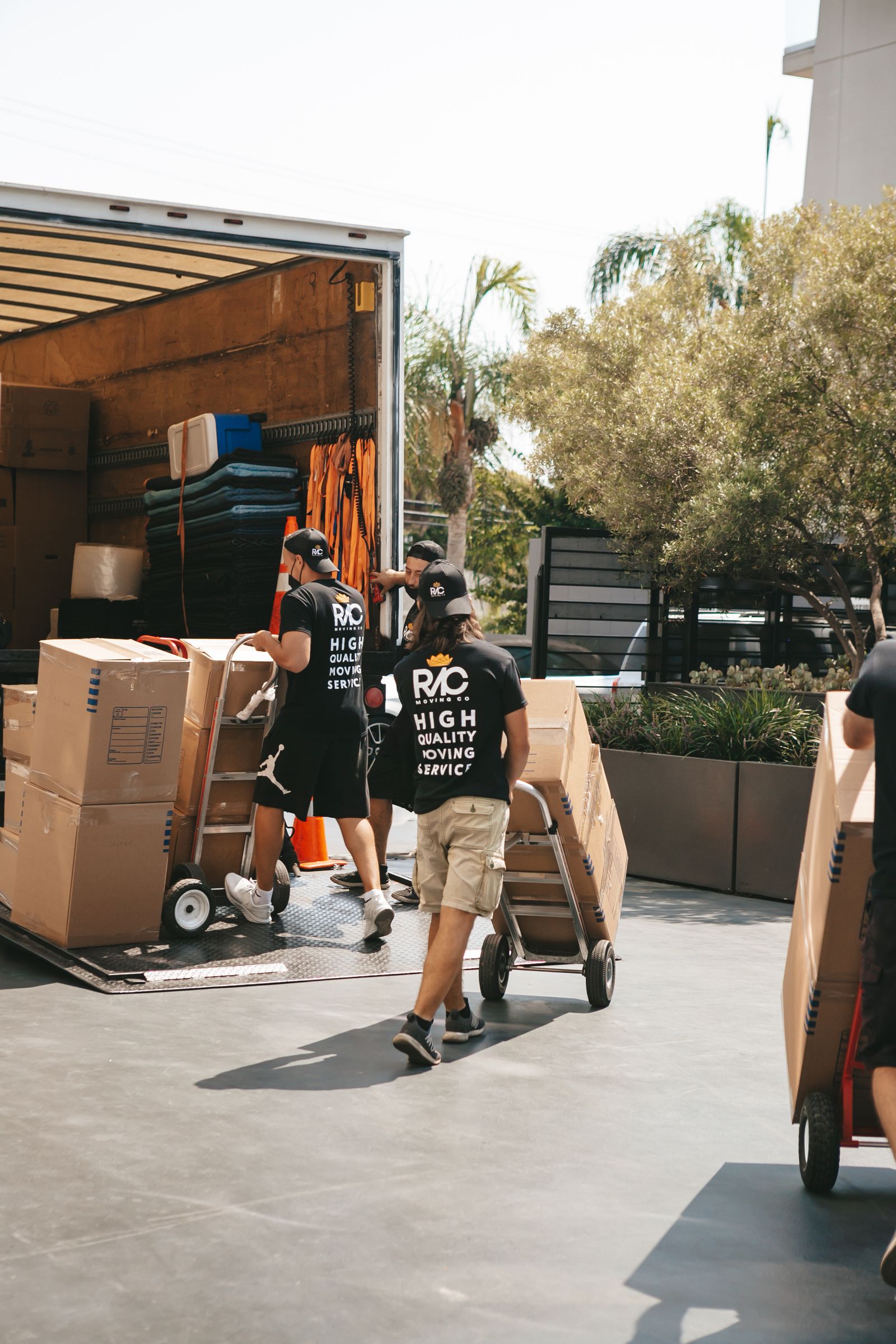 Movers loading boxes onto a truck