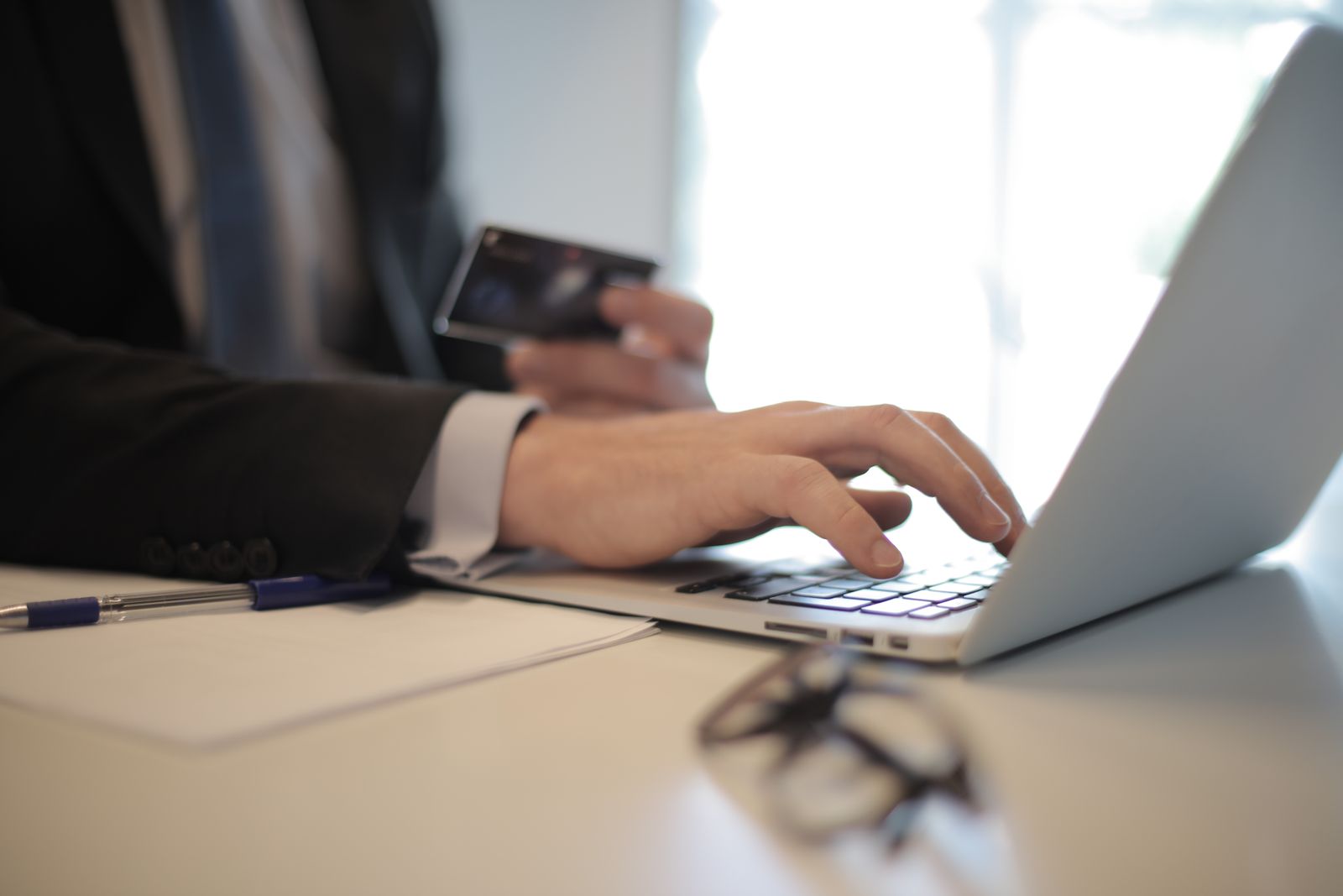 Paying by card on a laptop